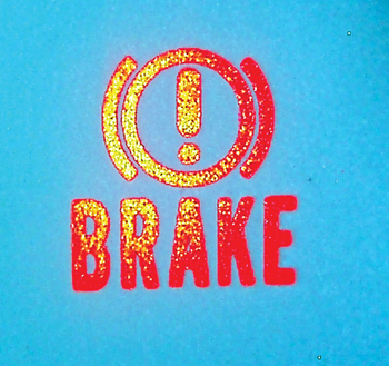 photo 3: the red brake warning light ­indicates that the park brake is applied or that a hydraulic failure is present. 