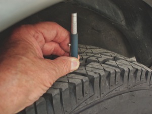 Photo 4: Measuring wear across the tire tread can reveal the need for a tire rotation and perhaps a wheel alignment.