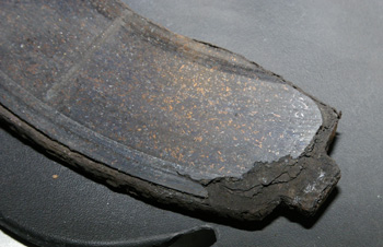 rust jacking of the friction material from the backing plate will cause noise.