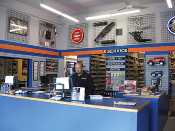 photo 1: z sports’ charles is ready to greet  customers at a well-laid-out front counter.