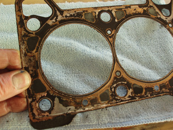 photo 2: the cylinder head on this 2002 hyundai was removed to repair bent valves caused by a failed timing belt. the steel shim-style head gasket appears to be sealing well around the cylinders and water ports.
