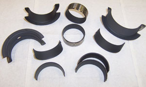 assortment of bearings freshly coated with h.m. elliot coatings' dry film lubricant.