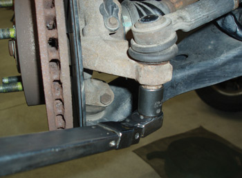photo 5: torquing a threaded suspension component to specification prevents ­damaging the threads and ensures that the retaining nut won’t loosen during ­normal driving conditions.