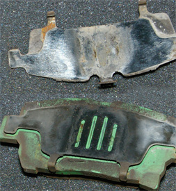two-piece brake pad shim from a toyota prius
