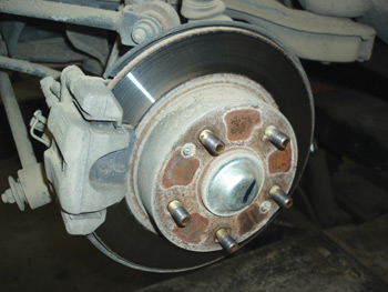 photo 1: brake service is more than replacing brake friction. the most important issue is customer satisfaction.