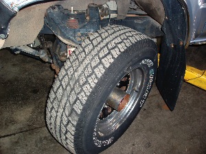 photo 2: although this tire is slightly larger than oe, it allows a full 40 degrees of turning radius at full compression at full droop without touching the rear fender well.