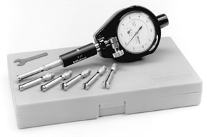 A valve guide dial bore gauge allows you to see where the peaks and valleys are.