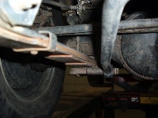 photo 4: sagging front leaf springs on early suvs can cause a loss of positive caster angle and a steering wander complaint. 