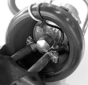Figure 6: Attach your existing harness to the new pump as shown.