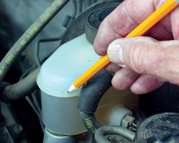 photo 5: brake fluid level and condition can be an indicator of worn brake pads and leaking wheel cylinders. 