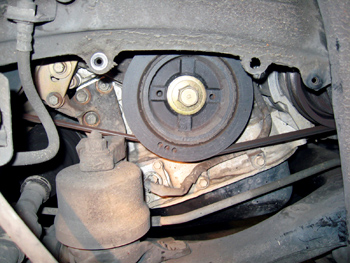 photo 2: remove the inner fender cover plate for access to the crankshaft pulley.