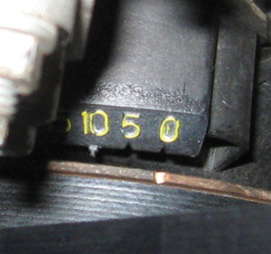 photo 4: line up the timing mark on the pulley with the timing tab on the lower cover before disassembly.