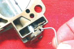 photo 8: use a 3/32” hex wrench to loosen the lock screw on the air valve spring preload adjustment. 