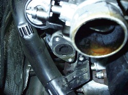 photo 1: the egr cooler (small flange below intake) appears to be where the problem starts.