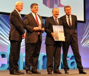 From left: Prime Minister of Hessen, Volker Bouffier; Nick Colarelli, Hunter executive vice president; Hunter chairman Steve Brauer; and Detlef Braun, Automechanika Exhibition Director, Frankfurt.