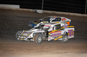 David Murray Jr. of Oberlin, KS, and Ricky Alvarado of Delta, CO, run side-by-side at the 2008 Duel In The Desert at Las Vegas Motor Speedway.